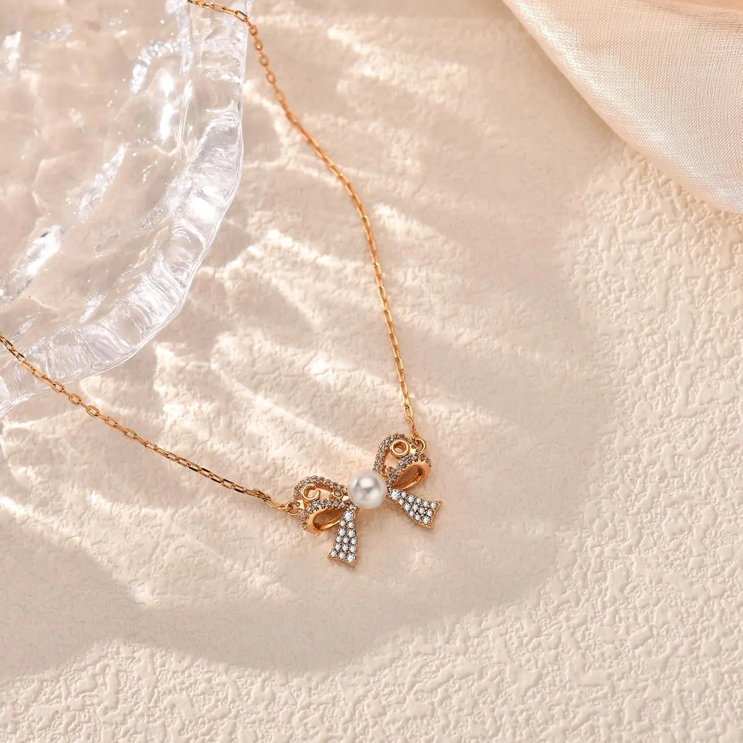 JINEAR Dainty Gold Necklace for Women14K Gold Bow Pealr Necklace Heart Interlock Necklace Gold Teardrop Pendant Necklace Simple Choker Necklaces Jewelry Gifts